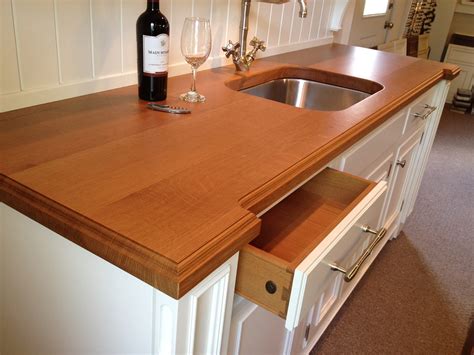 You can get several advantages with wooden countertops. White Oak Wood Kitchen Counter in New Jersey