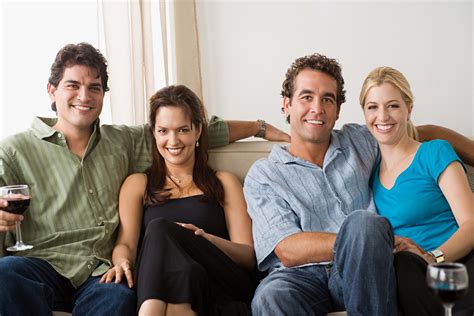 640x1136 Resolution Photo Of Two Men And Two Women Sitting On Sofa Hd Wallpaper Wallpaper Flare