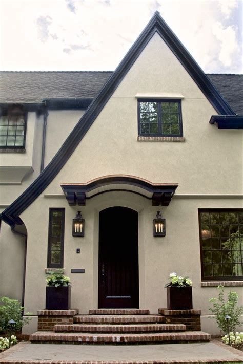 I painted it white ( i would usually use a cream color but i didn't have anymore and i just couldn't wait until i got to the store) as soon as it. Tudor Revival Home (With images) | Stucco house colors ...