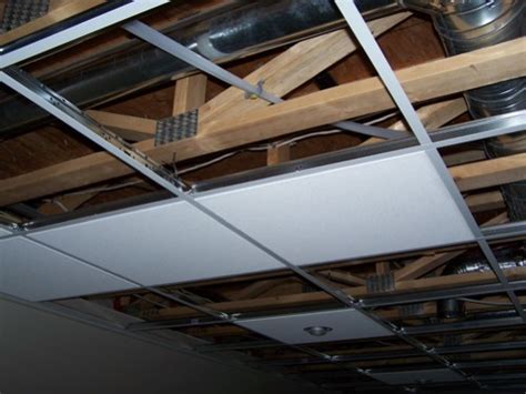 Installing a suspended ceiling can serve to reduce heating or even cooling costs in some buildings by How To Install A Suspended Ceiling