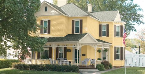 Here, forest and meadow colors create a woodsy exterior scheme for the twin peaks lover sweet cottage candy. Suburban Traditional - Sherwin-Williams
