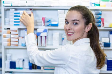 Pharmacist Checking A Medicine In Pharmacy Stock Image Image Of