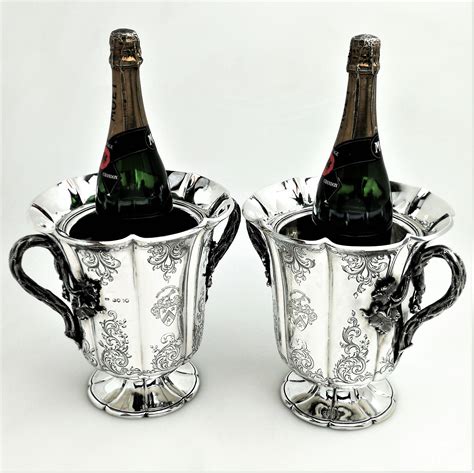 Check out our silver floral shield selection for the very best in unique or custom magical, meaningful items you can't find anywhere else. Pair of Antique Victorian Sterling Silver Wine Coolers ...