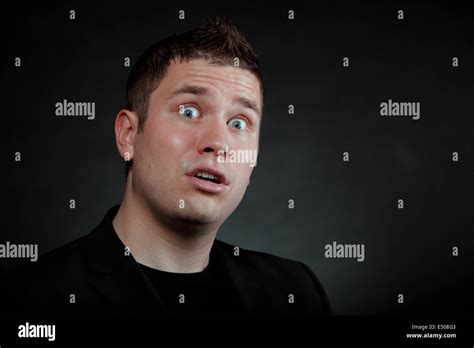 Surprised Shocked Man Wide Eyed Face Stock Photo Alamy