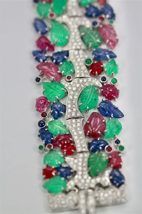 Tutti Frutti Carved Stones Diamond Bracelet 18 Karat Wide For Sale At