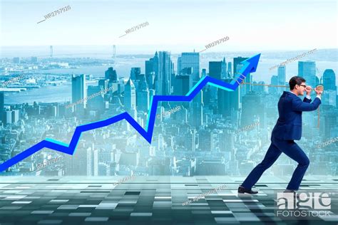 Businessman Supporting Increase In Economy Stock Photo Picture And