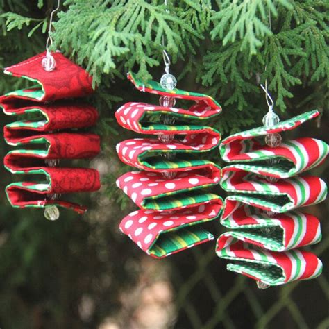 From ornaments that look like candy, to beaded christmas ornaments to make, to homemade christmas ornaments that look like santa and angels, you have an array of 70+ simple homemade christmas ornaments to choose from! Fabric Ribbon Candy Ornament — Crafty Staci | Fabric ...