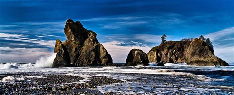 Look south to the forested james and little james islands, while waves crash over gunsight rock and numerous offshore sea stacks. Sunset, Sunrise at Rialto beach, WA