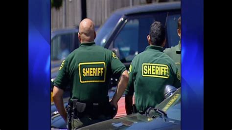 FBI arrests sheriff's officials in L.A. County jail abuse probe - YouTube