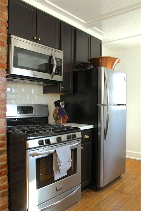 4+ average star rating · free shipping over $2,500 Example of a 12 inch base cabinet between a stove a fridge ...