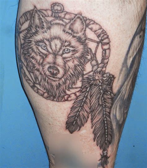 10 Meaningful Wolf Dreamcatcher Tattoo Designs