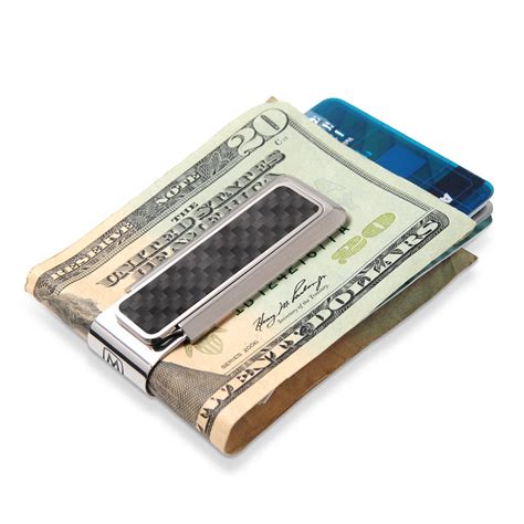 The curved surface makes it easy to slide bills/cards into and out of the clip. Stainless With Black Carbon Fiber Money Clip | M-Clip.com ...