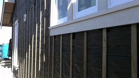 Failure to adhere to our warnings, safety data sheets, and installation instructions may lead to serious personal injury or death. How we Rainscreen a house - YouTube