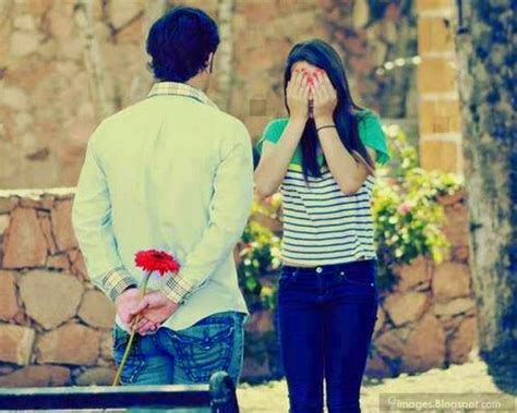 Pick a symbolic gift to propose to him with. boy propose cute girl red rose flower couple romantic