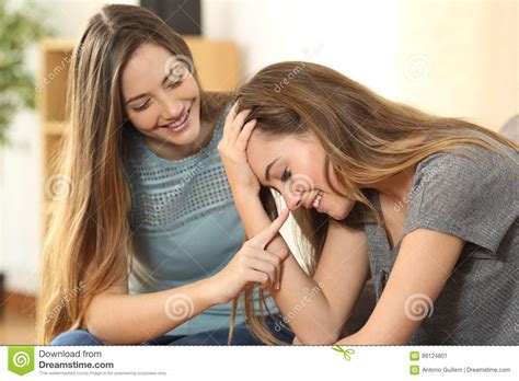 Girl Trying To Comfort To Her Sad Friend Stock Image
