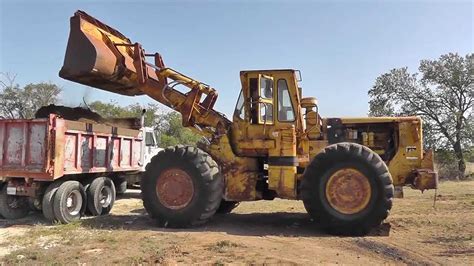 Cat 950m loader moving topsoil hoornstra n.v. CAT 988 & Dump Truck - YouTube