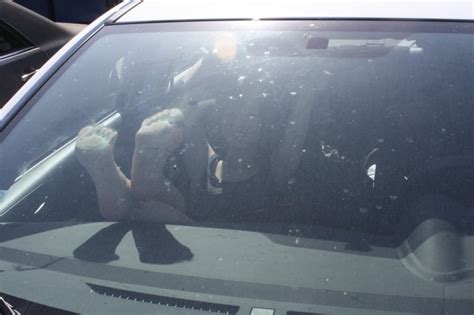 Feet On Dashboard And Footprints On Windshield The Mousepad