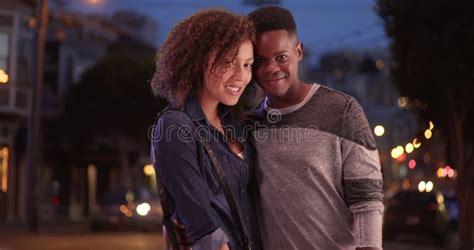 millennial african american couple pose for a portrait at night in san francisco stock video
