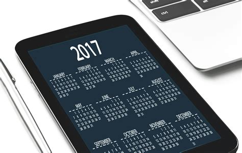 Black Tablet Computer Displaying 2017 Calendar · Free Stock Photo