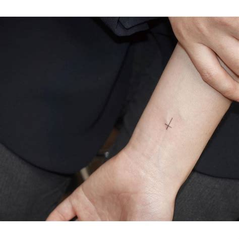 Minimalist Cross Tattoo On Wrist