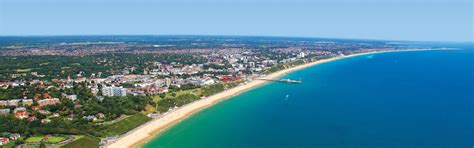 You'll spot plenty of people along bournemouth beach and the nearby bays every day of the year. Bournemouth Beach | Explore Bournemouth's Beautiful Beaches