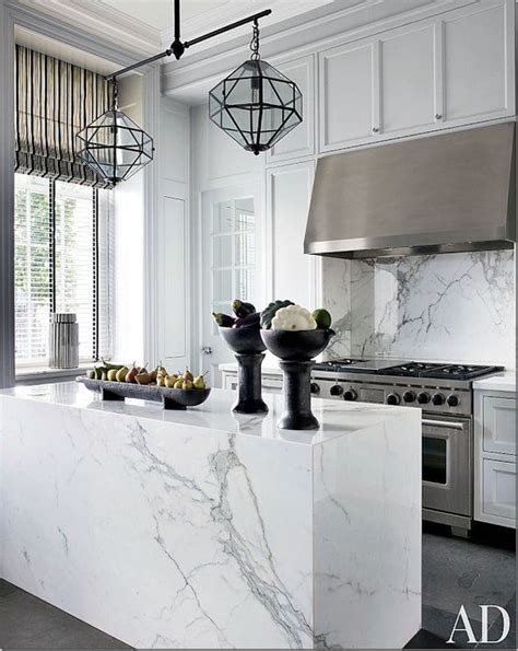 One of the best places to add a design touch in the kitchen is on the countertop. 48 Marble Kitchens That Are BEYOND Gorgeous!