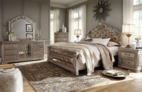 Put storage out of sight. Birlanny Silver Upholstered Panel Bedroom Set from Ashley ...