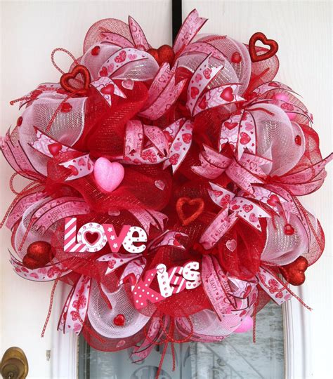 With only a few supplies and a quick tutorial, this wreath comes to life with sweet felt roses, a heart garland, and a. Valentine's Deco Mesh Wreath | My Deco Mesh Creations ...