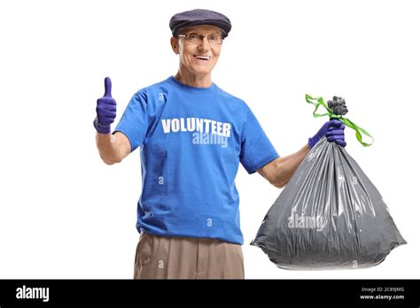 Elderly Volunteer Holding A Waste Bag And Showing Thumbs Up Isolated On