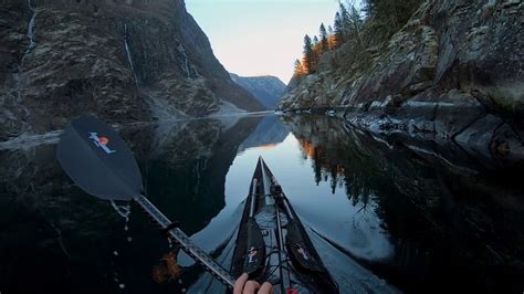 Kayaking Along Beautiful Norwegian Fjords Captured In Stunning