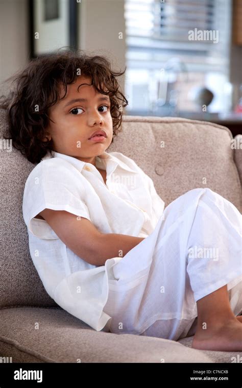 Boy On Couch Stock Photo Alamy