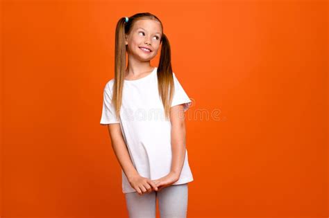 photo portrait of cute little lady cute shy pose look empty space wear trendy white garment