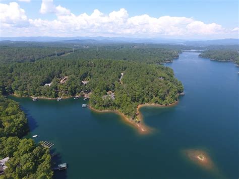 Enjoy maintenance free living in this luxury, lakefront 3 level townhome, perfect for entertainin. 6 Reasons to Move to Lake Keowee Waterfront Land for Sale