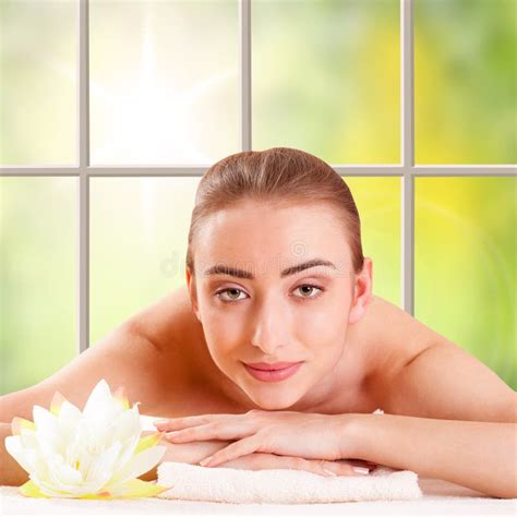 Beautiful Young Woman Getting Spa Massage Lying On Salon Stock Photo