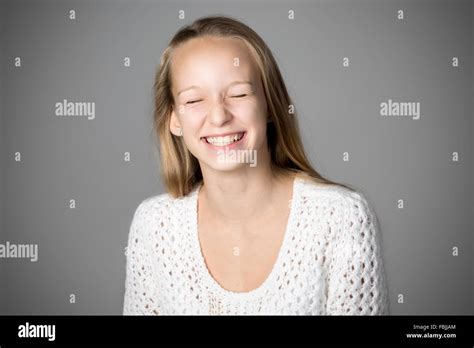 Portrait Of Happy Beautiful Casual Caucasian Teenage Girl Wearing White
