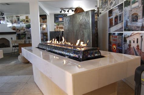 Extend your seasonal outdoor living with a stonework fire pit or fireplace. waterfall fire pit combinations | Fire Table with Water ...