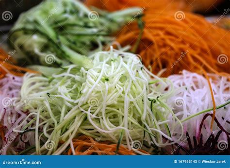 Different Raw Shredded Vegetables And Fruits As An Example Of A Healthy