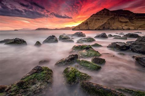 Landscape Sunset Sea Rocks Stones Clouds Wallpapers
