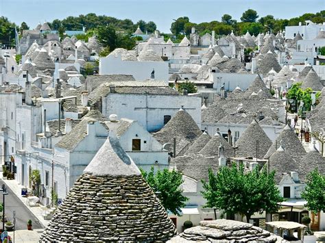 The Conical Roofs Of The Trulli Of Alberobello Italy A Traditional