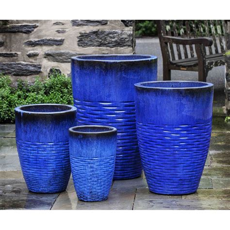 When it ships, it is about 12 inches tall, but it continues growing with time. Hyphen Tall Glazed Ceramic Planters Blue | Kinsey Garden Decor