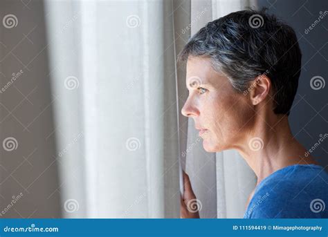 Older Woman Looking Out Window Stock Image Image Of Beautiful Older
