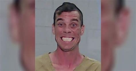 Man Accused Of Robbing Thrift Store Smiles In Mugshot After Arrest