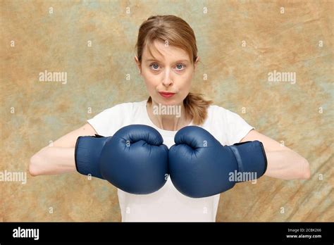 Young Attractive Female Boxer Ready To Fight In Sport Equipment Stock