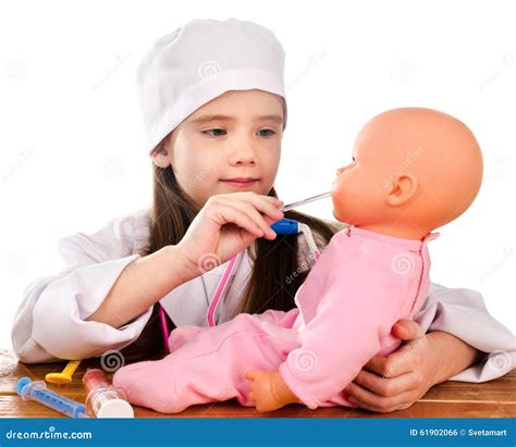 Adorable Little Girl Playing At The Doctor Stock Photo Image Of Cute