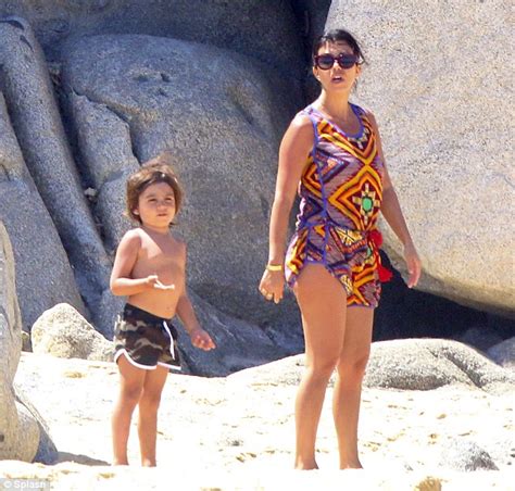 keeping up with kourtney kardashian shows off toned physique in blue bikini as she goes for