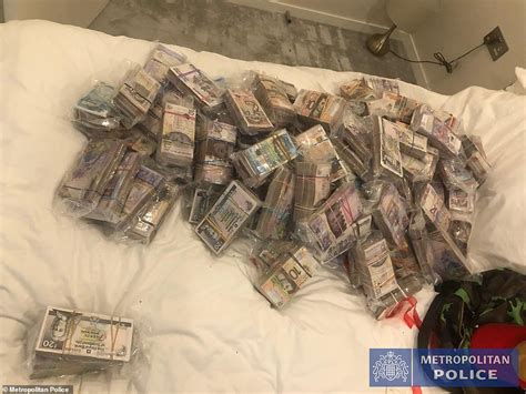 Raids have so far seen more than £54m. Pictured: Astonishing mountain of dirty cash, guns and ...