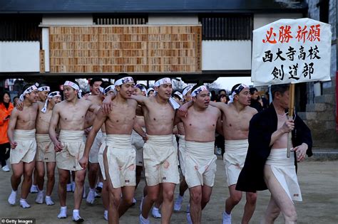 Ten Thousand Men Strip Down To Loincloths And Jostle For Lucky Sticks Daily Mail Online