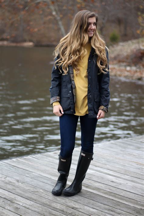 perfect fall outfit including a barbour coat united tee fall t shirt and black hunter boots