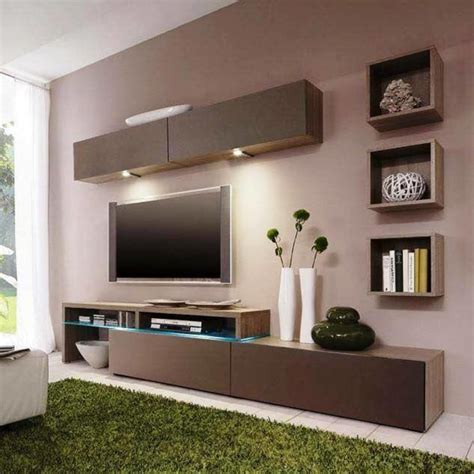 The north east or the south west directions are best avoided as fast as electronics changes your modern tv will be old news as soon as you put it in. 9 modern TV units in your living room