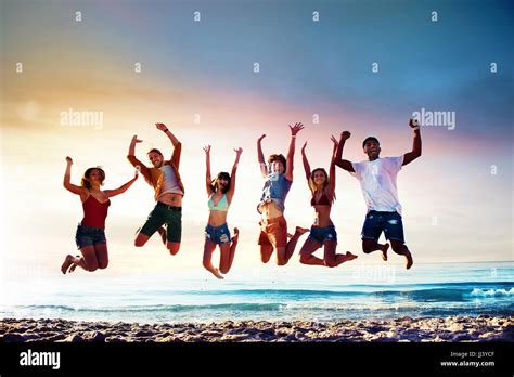 Cheerful People Jumping Friendship Happiness Hi Res Stock Photography